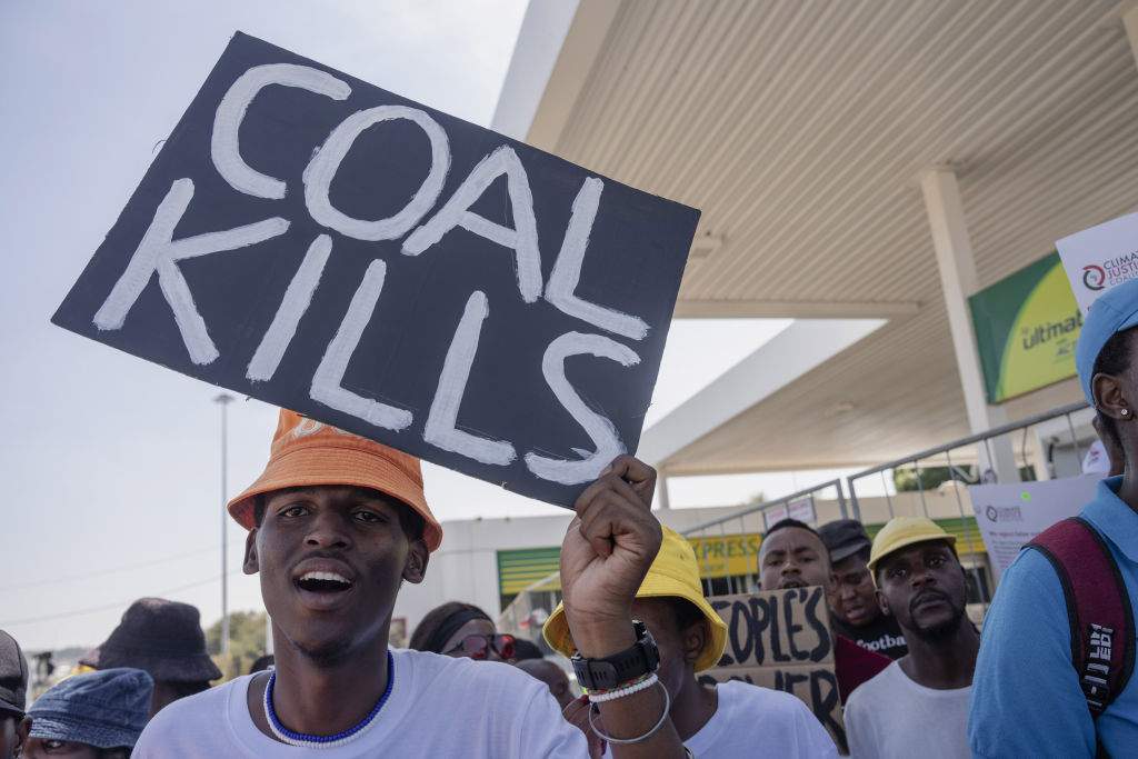 2m ago Share ‘Coal is not the problem': Eskom backs new tech to keep old stations open A group of environmental activists gathered to protest against the state-owned energy company Eskom, over air pollution caused by high coal use in Soweto on 20 March last year. Ihsaan Haffejee/Anadolu via Getty Images Eskom is determined to keep running coal-fired power stations for as long as it can. Eskom's research teams are looking into emissions-reduction technology to continue running coal power stations for longer. Executive Bheki Nxumalo admitted it would be difficult for Eskom to comply with emissions standards beyond 2030. For climate change news and analysis, go to News24 Climate Future . ADVERTISEMENT ADVERTISEMENT Kusile is the only power station which complies with all emissions standards. Eskom/ Supplied ADVERTISEMENT Eskom plans to deocmmission as much as 23 GW of coal by 2040. Eskom/ Supplied Komati: 1 220MW of solar PV, 150MW of battery energy storage Grootvlei: 195MW of solar PV, 150MW of BESS Arnot: 200MW of battery energy storage, 168MW of wind, 800MW of solar PV Camden: 680MW solar PV Hendrina: 587MW solar PV Kriel: 800MW solar PV, 200MW battery energy storage, 1 000MW gas Newsletter Daily SA Money Daily The biggest business, economic and market news of the day. Next on News24 Eskom's worst nightmare? SA pushes for an electricity market of the future 14 Jul ADVERTISEMENT We use cookies to improve your site experience, perform analytics and show you relevant advertising. By clicking “OK”, you agree to the storing of cookies on your device. View our Cookie Policy & Cookie FAQ . The Media24 Privacy Notice was last updated on 30 August 2024. View our Privacy Policy & Privacy Portal . Privacy Preference Center When you visit any website, it may store or retrieve information on your browser, mostly in the form of cookies. This information might be about you, your preferences or your device and is mostly used to make the site work as you expect it to. The information does not usually directly identify you, but it can give you a more personalised web experience. Click on the different category headings to find out more. View our Cookie Policy Cookie Types Strictly Necessary Cookies Always Active These cookies are necessary for the website to function and cannot be switched off in our systems. They are usually only set in response to actions made by you which amount to a request for services, such as setting your privacy preferences, logging in or filling in forms. You can set your browser to block or alert you about these cookies, but some parts of the site will not then work. These cookies do not store any personally identifiable information. Performance Cookies Always Active These cookies allow us to count visits and traffic sources so we can measure and improve the performance of our site. They help us to know which pages are the most and least popular and see how visitors move around the site. All information these cookies collect is aggregated and therefore anonymous. Functional Cookies Always Active These cookies enable the website to provide enhanced functionality and personalisation. They may be set by us or by third party providers whose services we have added to our pages. Targeting Cookies Always Active These cookies may be set through our site by our advertising partners. They may be used by those companies to build a profile of your interests and show you relevant adverts on other sites. They do not store directly personal information, but are based on uniquely identifying your browser and internet device. Cookie List Search Icon checkbox label label checkbox label label checkbox label label checkbox label label