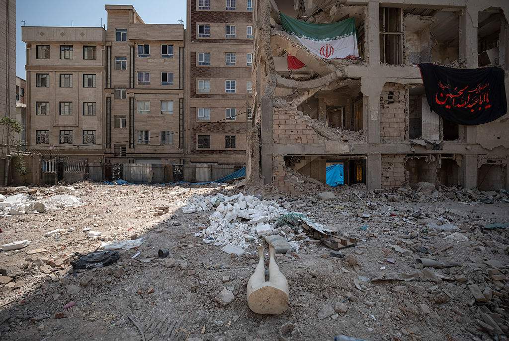 News24 | Under airstrikes, Iran defiant on eve of Trump's ceasefire deadline