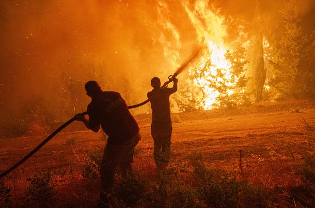 3 dead, thousands evacuate as huge wildfires, heatwave hit Europe | News24