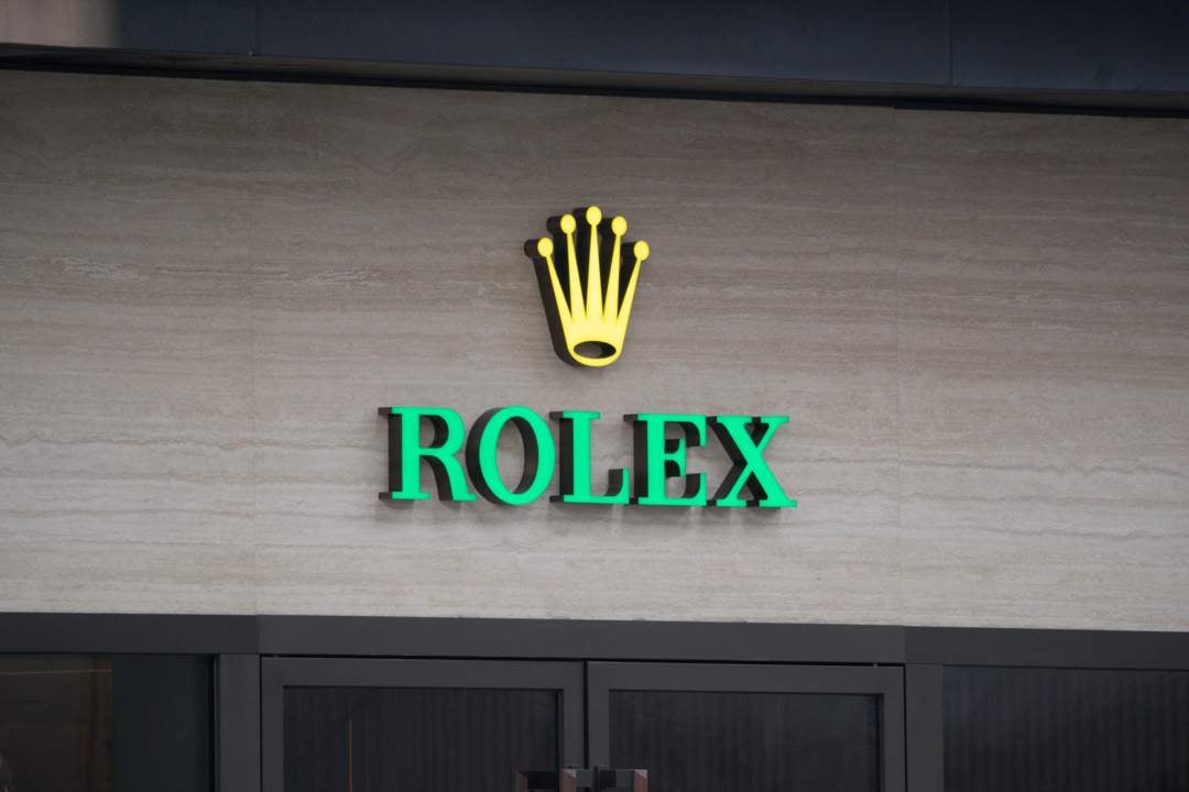 In an efficient market, a gold Rolex watch would be worth more, since gold is worth far more than platinum.