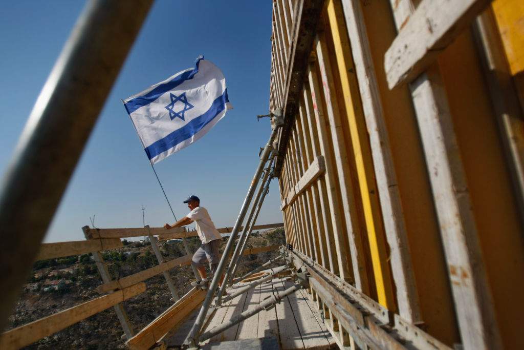 Israel approves major settlement expansion in occupied West Bank, defies international law
