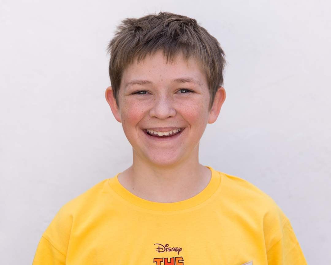‘Now I love to sing': Jason Woollatt's journey, from hearing loss to solo in Lion King Jr