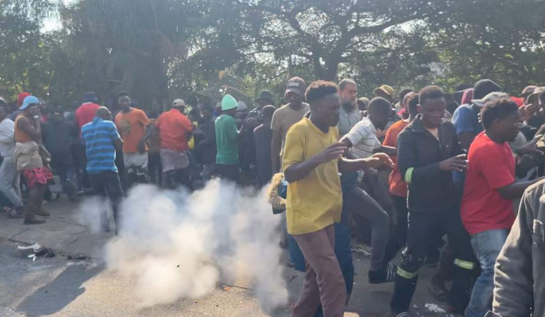 Teargas and tensions spike as stranded Malawians clash with cops in Durban